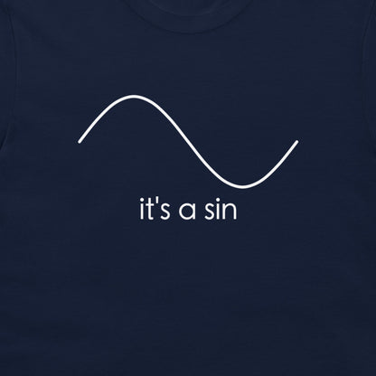 A close-up of a navy blue t-shirt featuring a white minimalist graphic of a sine wave and the text 'it's a sin' printed below it.