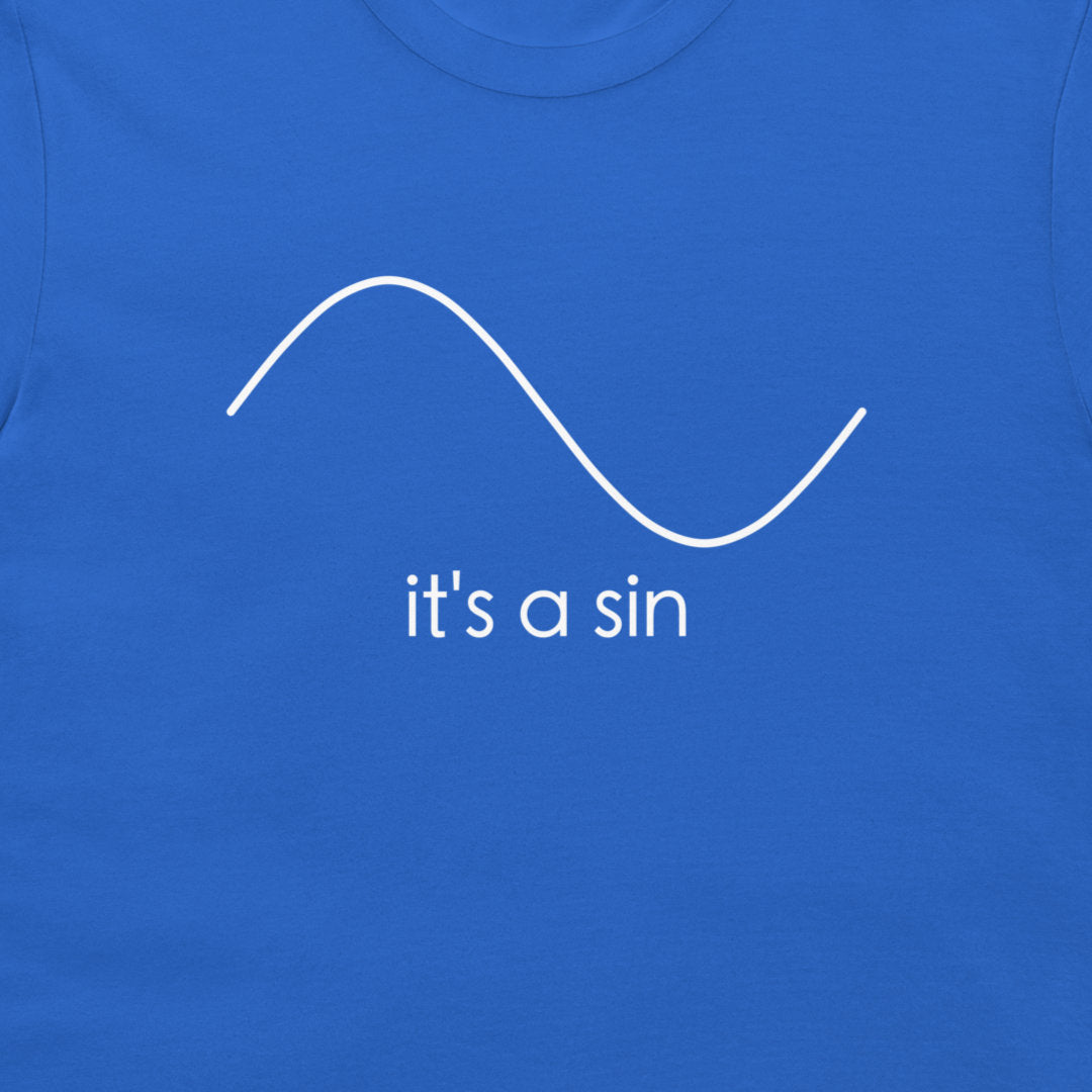 A close-up of a royal blue t-shirt featuring a white minimalist graphic of a sine wave and the text 'it's a sin' printed below it.