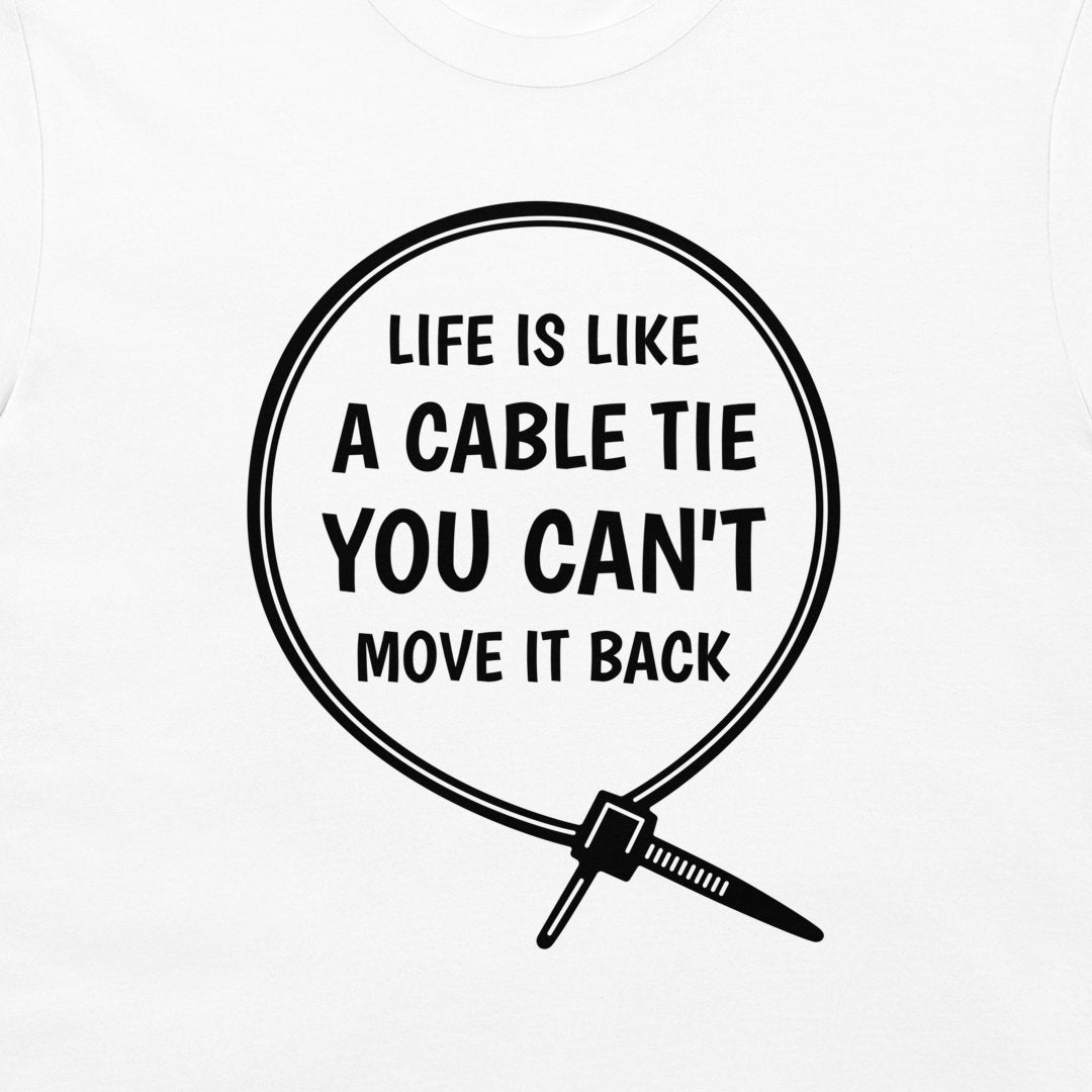 A white crewneck t-shirt featuring a black graphic print of a cable tie inside a circle with the humorous quote 'LIFE IS LIKE A CABLE TIE YOU CAN'T MOVE IT BACK'.