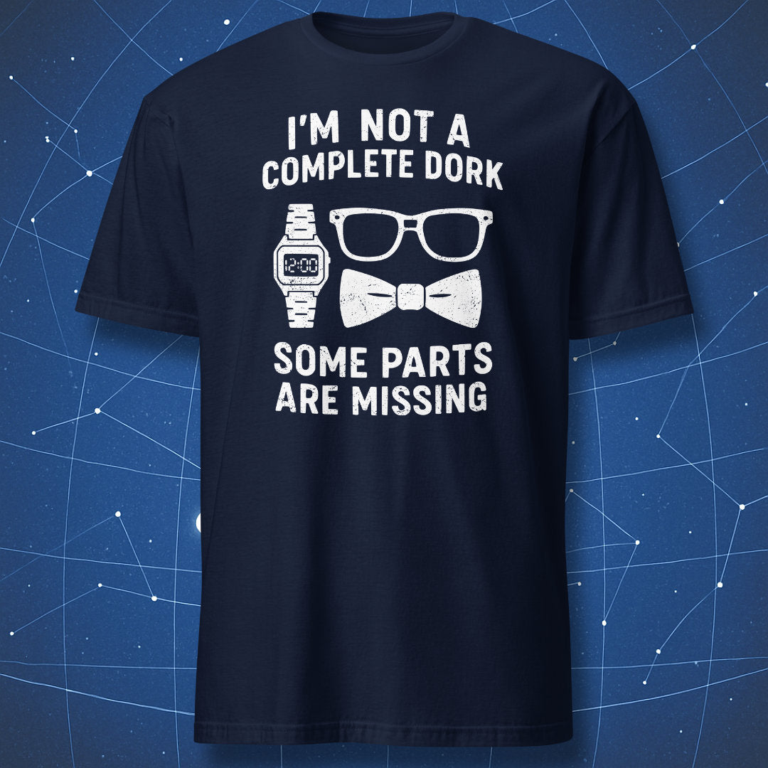 Navy T-shirt featuring white print of nerdy accessories (watch, glasses, bow tie) and text “I’m not a complete dork, some parts are missing.”