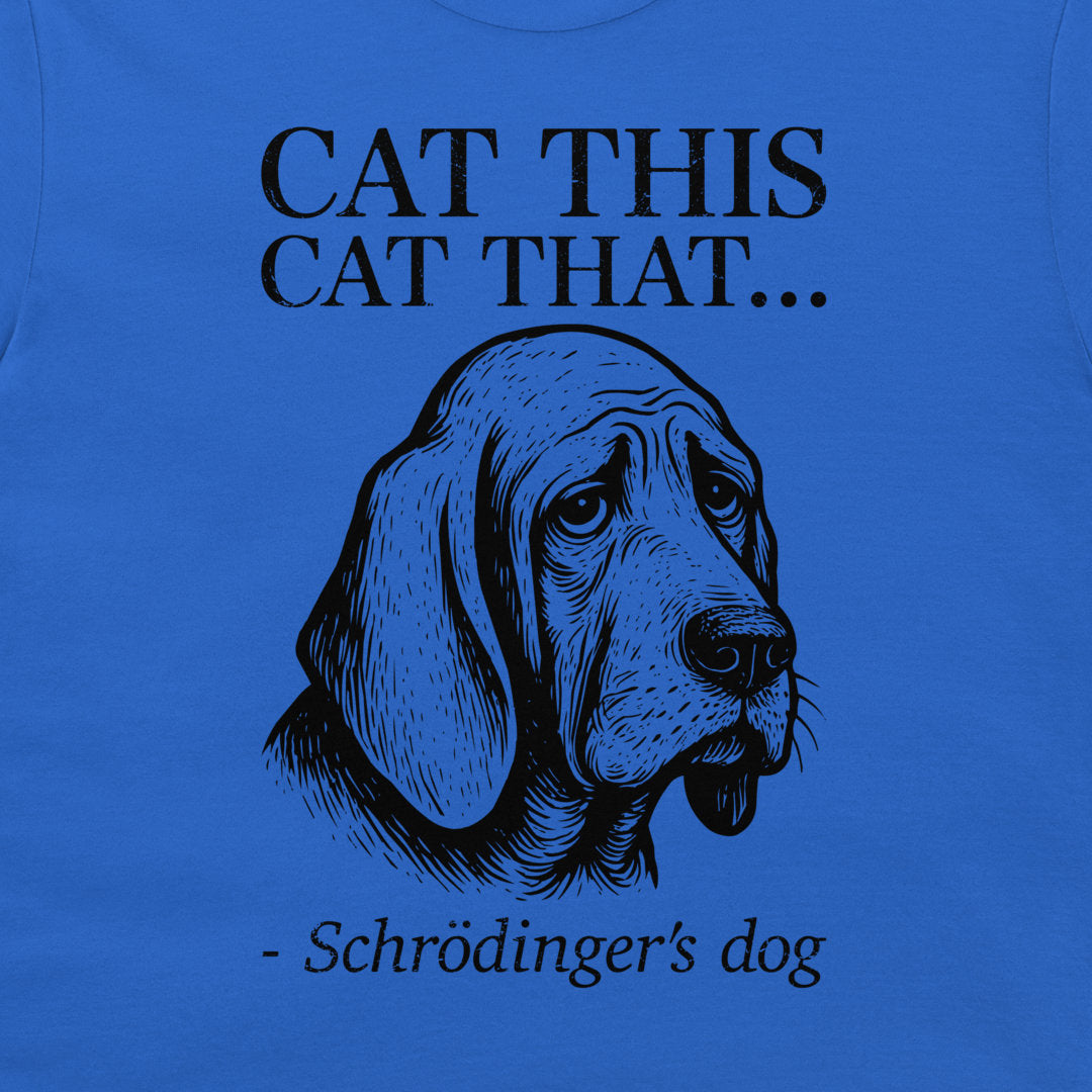 A close-up of a blue graphic print on a garment featuring the text 'CAT THIS CAT THAT - Schrödinger's dog.