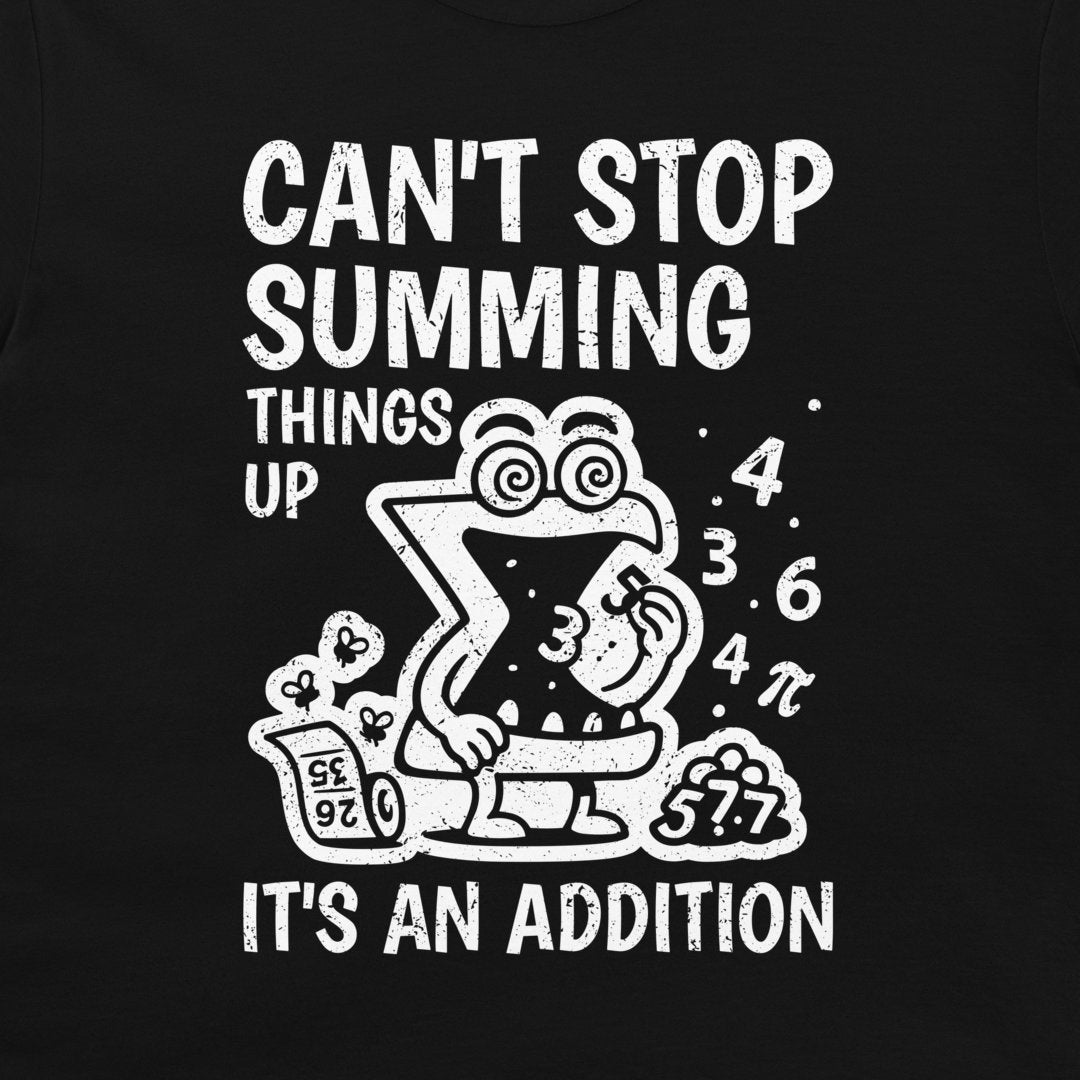 A black graphic t-shirt featuring a white distressed print that reads 'CAN'T STOP SUMMING THINGS UP' and 'IT'S AN ADDITION' around a cartoon character sitting in a toilet surrounded by mathematical symbols.