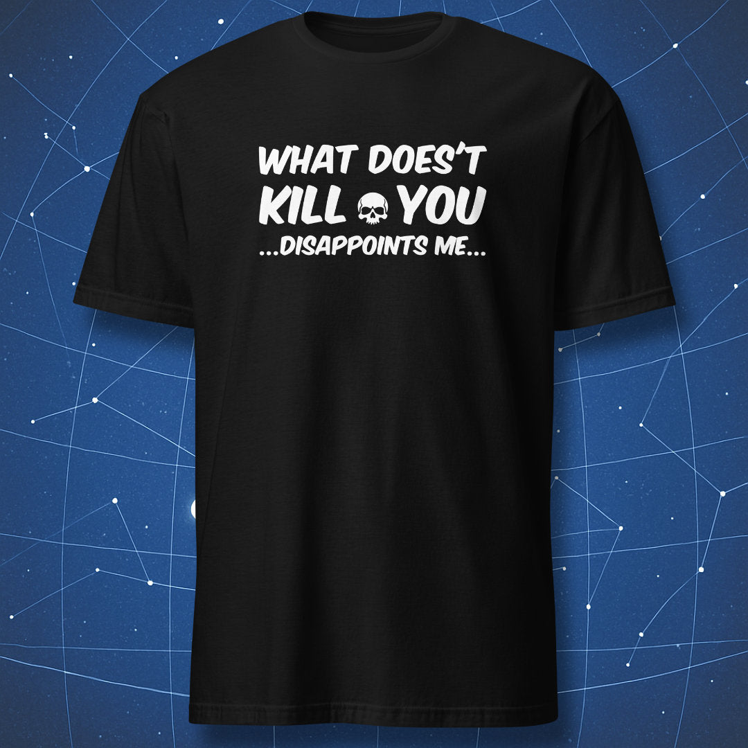 Black T-shirt with white text “WHAT DOESN’T KILL YOU… DISAPPOINTS ME…” and a small skull between the words — dark humor minimalist tee.