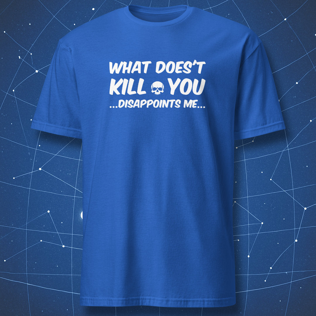 Royal blue T-shirt with white text “WHAT DOESN’T KILL YOU… DISAPPOINTS ME…” and small skull — dark geek humor design.