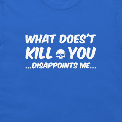A close-up of a royal blue t-shirt featuring a white graphic print that reads 'WHAT DOES'T KILL YOU DISAPPOINTS ME'.