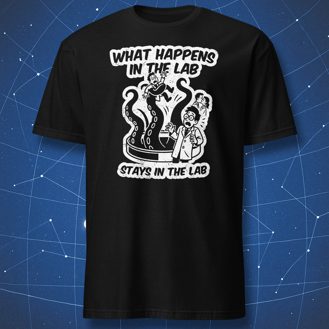 Black T-shirt with white comic-style “What Happens in the Lab Stays in the Lab” design showing a scientist and tentacled monster — funny science humor tee.
