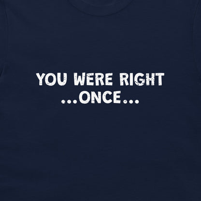 A close-up of a navy blue t-shirt featuring the phrase 'YOU WERE RIGHT .
