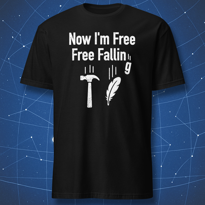 Black T-shirt with the text “Now I’m free, free fallin’ g” and icons of a hammer, feather, and gravity symbol — physics humor tee.