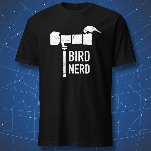 Black T-shirt with a white distressed print showing a camera and bird forming the words “Bird Nerd” — minimalist birdwatching humor tee.