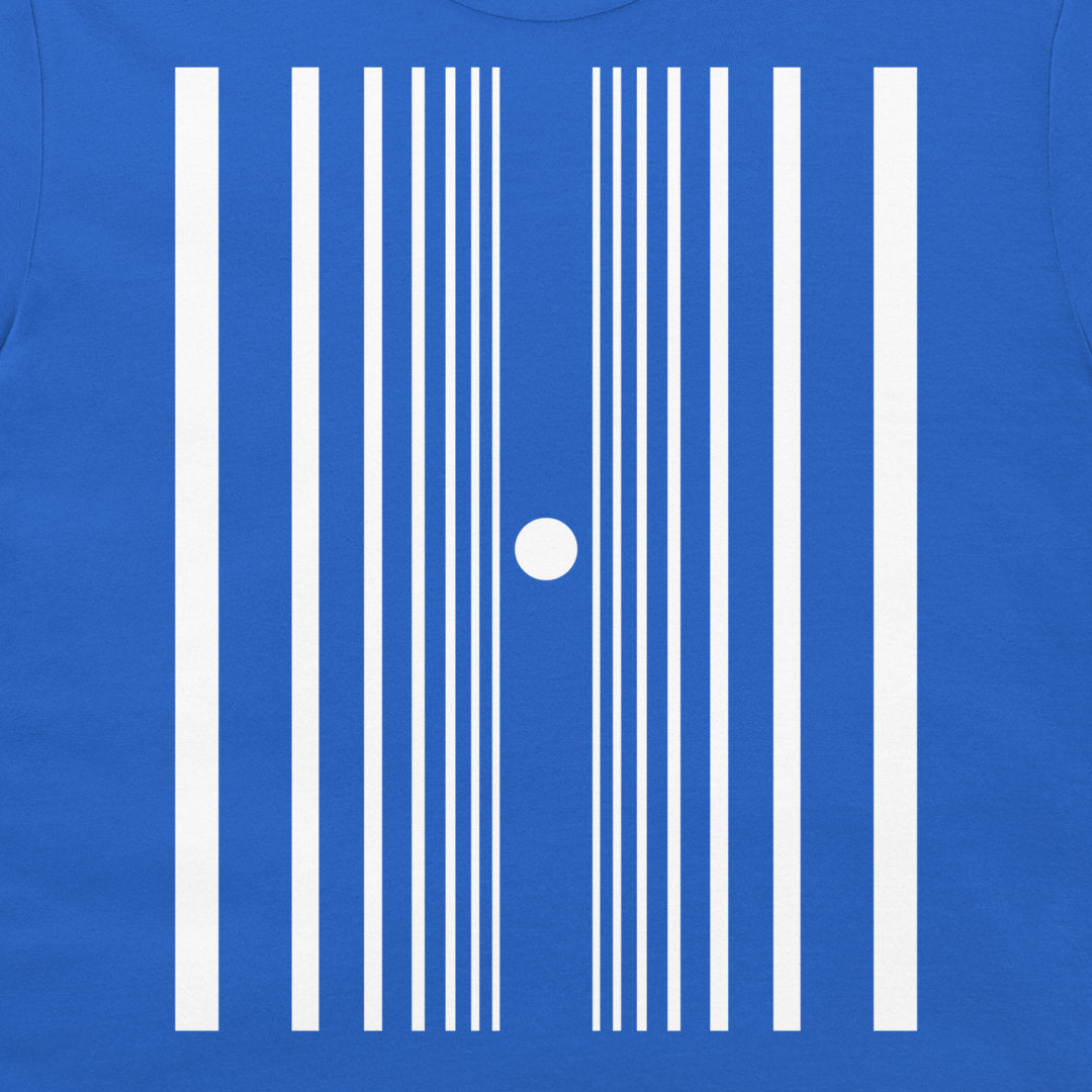 A close-up of a royal blue garment, likely a t-shirt, featuring a white graphic print of vertical stripes of varying widths and a small white circle in the center.