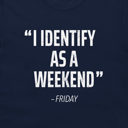 A close-up of a navy blue t-shirt featuring a distressed white typographic print that reads “I IDENTIFY AS A WEEKEND” with “- FRIDAY” underneath.