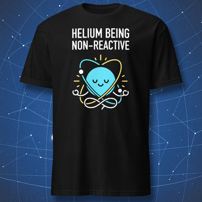 Black T-shirt with cute meditating helium atom illustration and text “Helium Being Non-Reactive” – funny chemistry and science humor shirt by DorkMatter.