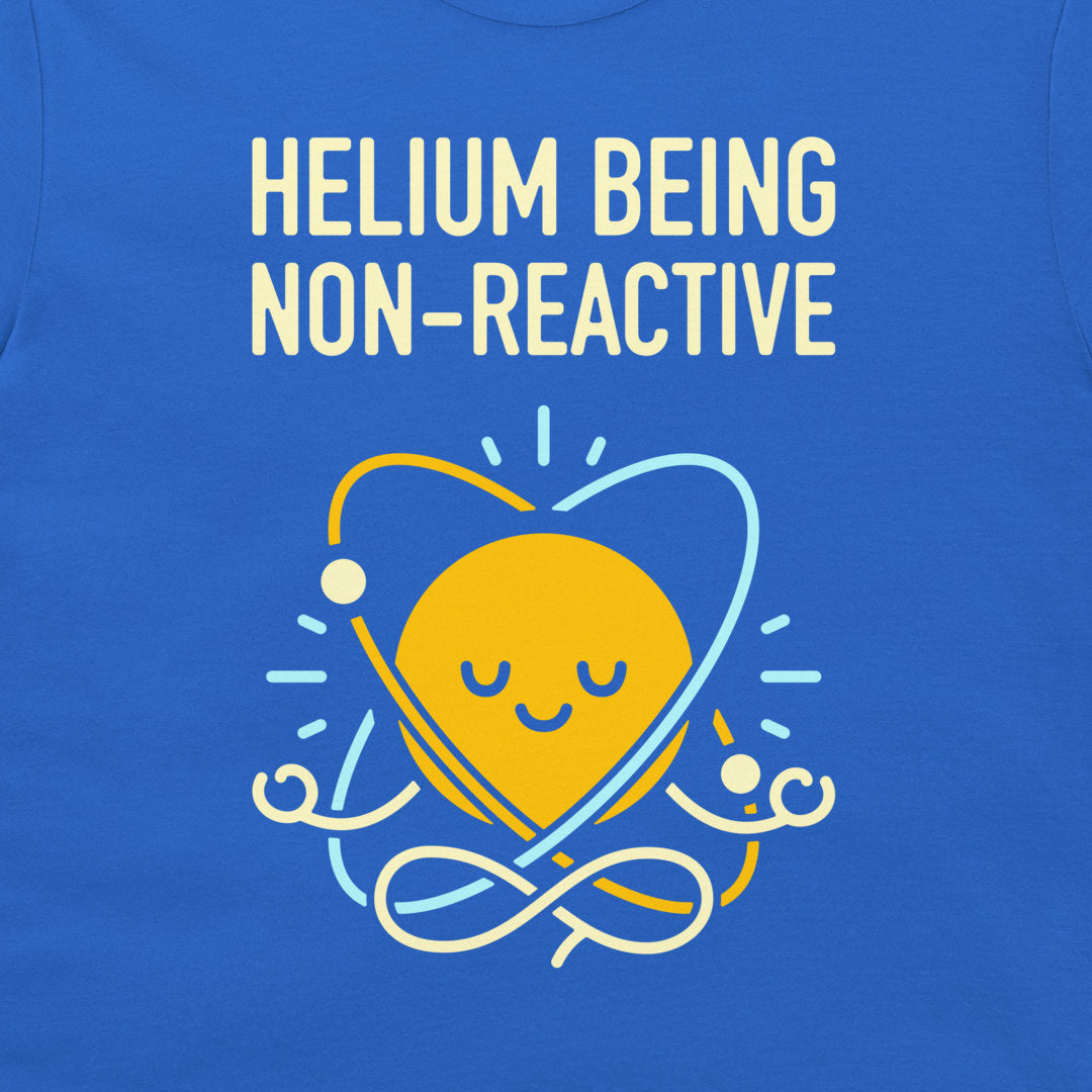 A close-up of a blue T-shirt featuring a graphic design. The design displays the text 'HELIOM Being NON-REACTIVE' in a cream-colored retro font, with a yellow meditating sun atom symbol below it in yellow, light blue, and white.