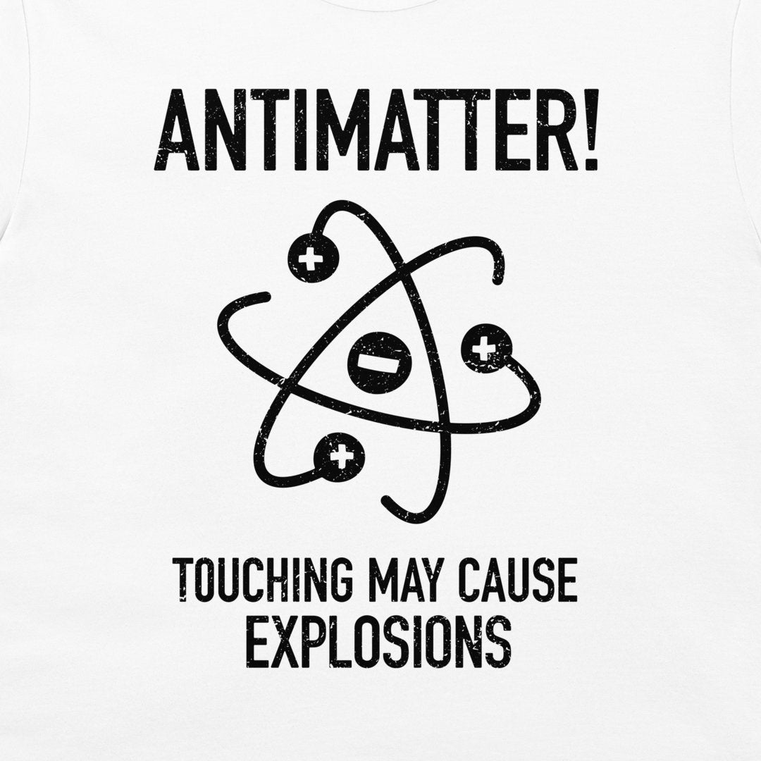 White t-shirt featuring a black distressed graphic of an atom with the text 'ANTIMATTER! TOUCHING MAY CAUSE EXPLOSIONS'.