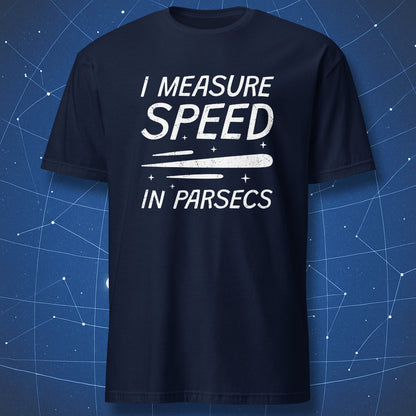 Navy T-shirt with distressed white text “I Measure Speed in Parsecs” and motion streak graphic – funny space and physics T-shirt by DorkMatter.