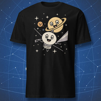 Black T-shirt with cartoon Voyager 1 probe flying through stars with smiling planets – cute space exploration T-shirt by DorkMatter.