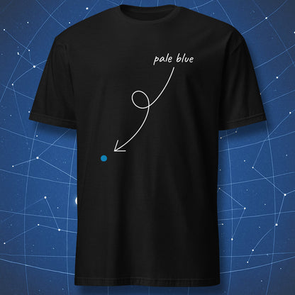 Black T-shirt with small blue dot and looping white arrow labeled “pale blue” – minimalist Carl Sagan-inspired design by DorkMatter.