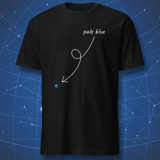 Black T-shirt with small blue dot and looping white arrow labeled “pale blue” – minimalist Carl Sagan-inspired design by DorkMatter.