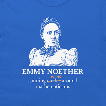 A close-up of a royal blue t-shirt featuring a white line art illustration of Emmy Noether with text below reading 'EMMY NOETHER' and 'running circles around mathematicians' with a small orange handwritten accent.