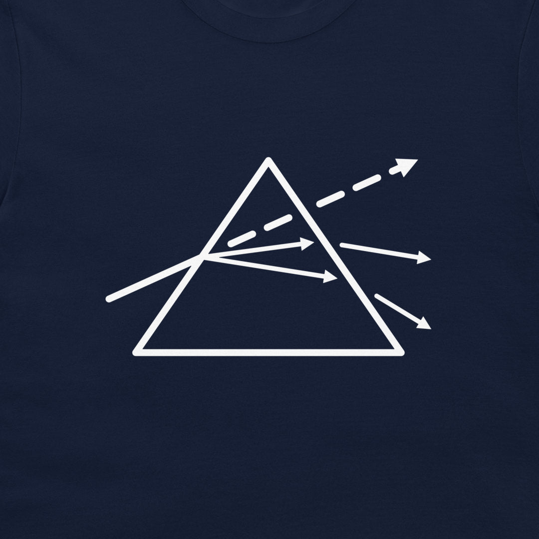 A close-up of a navy blue t-shirt featuring a white line-art graphic of a prism with light rays passing through it.