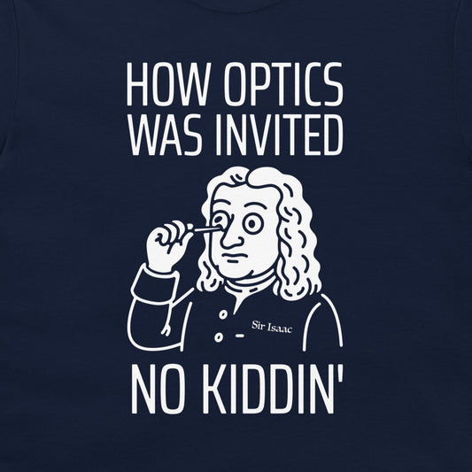 A close-up of a navy blue t-shirt featuring a white graphic print of Isaac Newton holding a magnifying glass, with the text 'HOW OPTICS WAS INVITED' above and 'NO KIDDIN'' below.