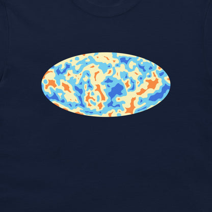 A close-up of a navy blue t-shirt, featuring a central oval graphic with an abstract, wavy pattern in light blue, orange, and cream.