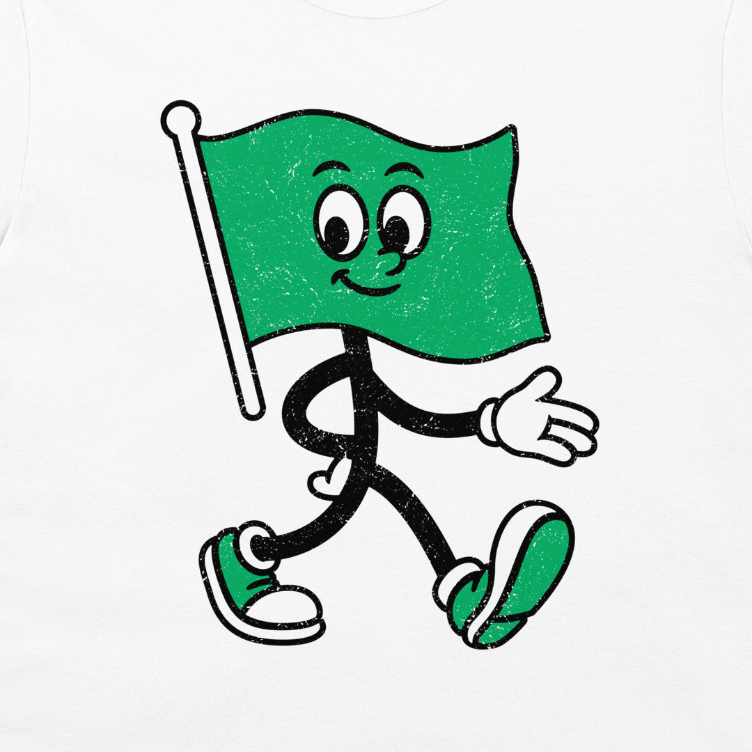 A green cartoon flag character with a smiling face, black stick body, white gloves, and green-and-white sneakers, printed on a white garment.