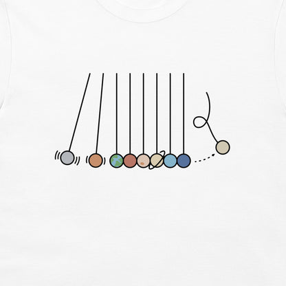 A close-up of a white t-shirt, featuring a printed graphic of a Newton's cradle with colorful planet-like beads.