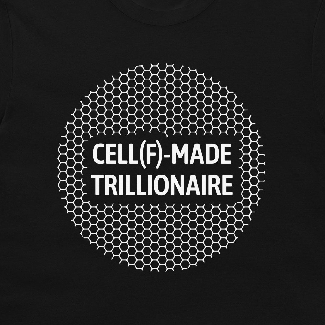A close-up of a black t-shirt, featuring a white graphic print. The design consists of a circular pattern of white hexagons with the text 'CELL(F)-MADE TRILLIONAIRE' printed in white capital letters across the center.