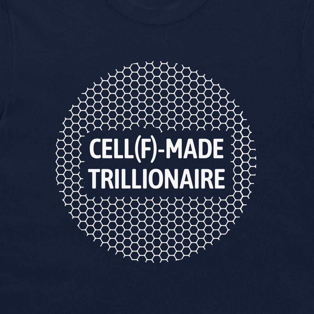 A close-up of a navy blue t-shirt, featuring a white graphic print. The design consists of a circular pattern of hexagons with the text 'CELL(F)-MADE TRILLIONAIRE' printed in white capital letters in the center.