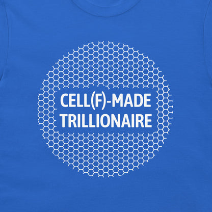 A close-up of a royal blue t-shirt featuring a white graphic design. The design consists of a circular hexagonal pattern surrounding the bold white text 'CELL(F)-MADE TRILLIONAIRE'.