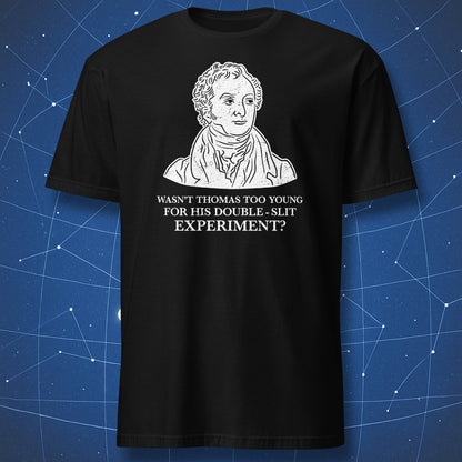 A black t-shirt featuring a white graphic print of a historical portrait of Thomas Jefferson with the text 'WASN'T THOMAS TOO YOUNG FOR HIS DOUBLE - SLIT EXPERIMENT?' printed below.