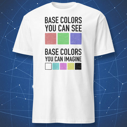 A white graphic t-shirt featuring a distressed black text design that reads 'BASE COLORS YOU CAN SEE' above three colored squares (red, green, blue) and 'BASE COLORS YOU CAN IMAGINE' below five additional color swatches including white, cyan, magenta, yellow, and black.