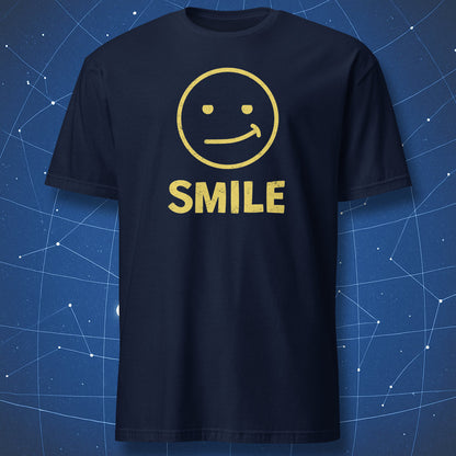 “Fake Smile” navy blue T-shirt — bold white smile graphic and text SMILE.