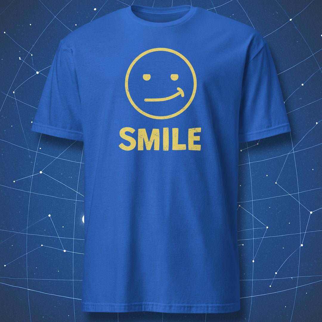 “Fake Smile” royal blue T-shirt — bold white smile graphic and text SMILE.