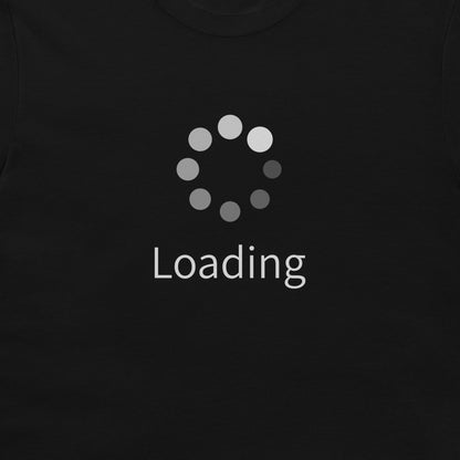 A close-up of a black t-shirt featuring a gray circular loading spinner graphic and the word 'Loading' printed below it in white.