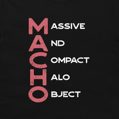 A close-up of a black graphic t-shirt featuring a distressed typographic design that reads 'MACHO MASSIVE AND OMPACT ALO OBJECT' in pink and white lettering.