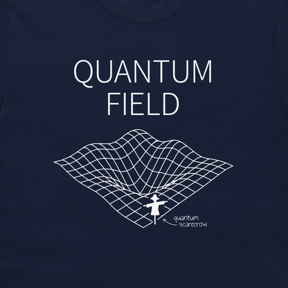 A close-up of a navy blue t-shirt featuring a white graphic print with the text 'QUANTUM FIELD' and a 3D grid illustration of a wormhole with a small figure labeled 'quantum scarcrow'.
