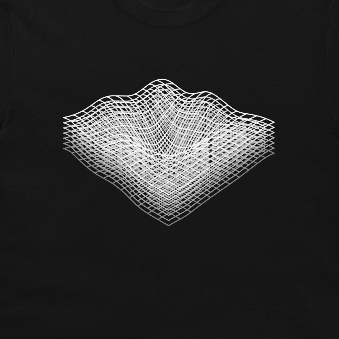 A close-up of a black t-shirt, featuring a white graphic print of a 3D wireframe grid landscape or wave pattern in the center.