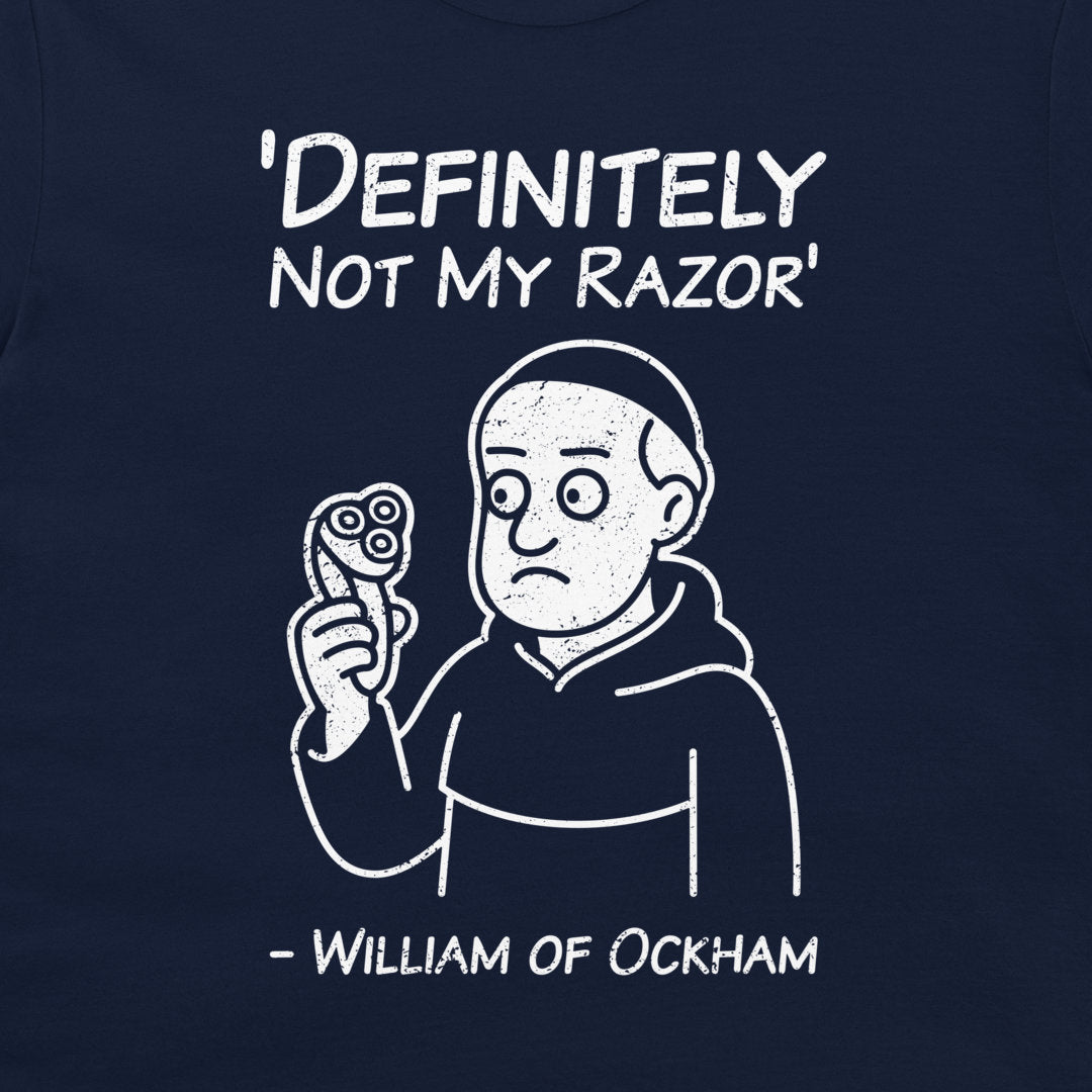 A close-up of a navy blue t-shirt featuring a white graphic print of a cartoon character holding a razor, with the text 'DEFINITELY NOT MY RAZOR' above and '- WILLIAM OF OCKHAM' below.