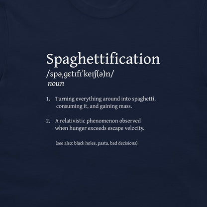 A close-up of a navy blue t-shirt featuring a white printed graphic that defines the word 'Spaghettification' with phonetic spelling and two dictionary-style bullet points.
