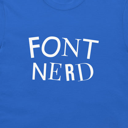 A close-up of a royal blue t-shirt featuring the words 'FONT NERD' printed in white serif lettering across the chest.