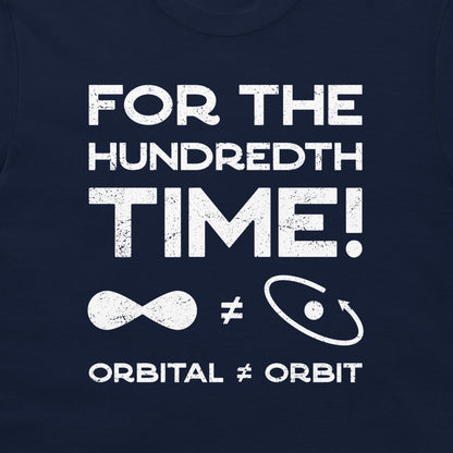 A close-up of a navy blue t-shirt featuring a distressed white graphic print that reads 'FOR THE HUNDRETH TIME!' with an infinity symbol, a non-equal sign, and an orbit symbol, concluding with 'ORBITAL ≠ ORBIT'.