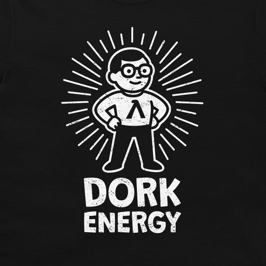 A black t-shirt featuring a white distressed graphic of a cartoon character with glasses and a Lambda symbol on the chest, surrounded by radiating lines, with the text 'DORK ENERGY' printed below.