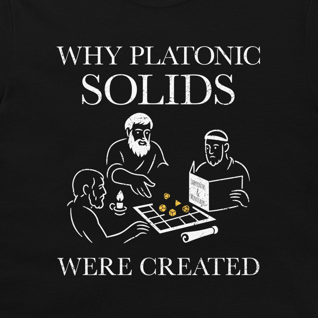 A black graphic t-shirt featuring a white distressed print that reads 'WHY PLATONIC SOLIDS WERE CREATED' with a line-art illustration of three philosophers discussing a game board with dice.