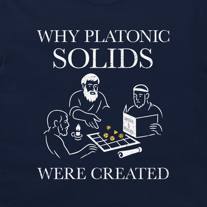 A close-up of a navy blue t-shirt, featuring a white graphic print. The text reads 'WHY PLATONIC SOLIDS WERE CREATED' surrounding a minimalist line-art illustration of three philosophers playing with dice.