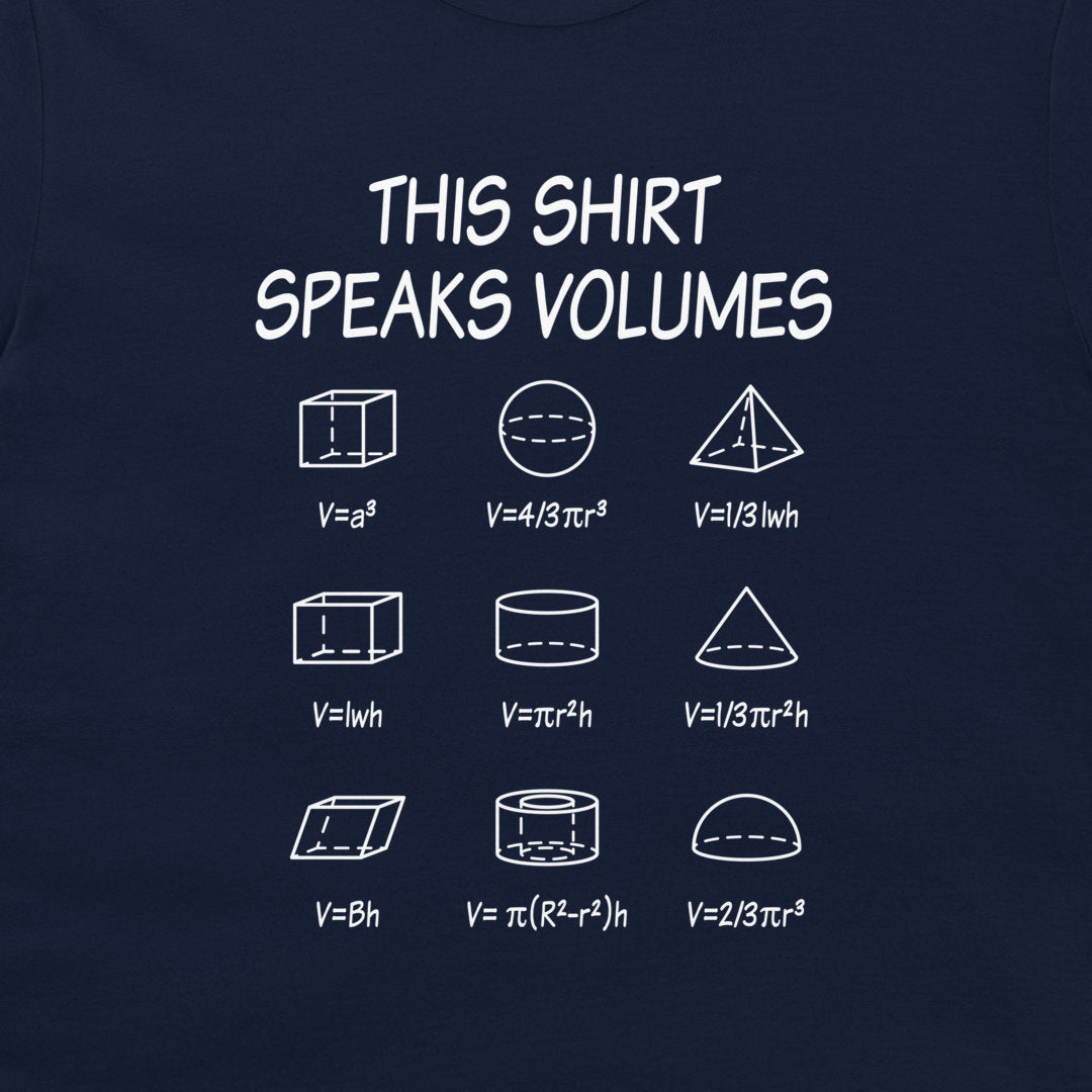 A navy blue t-shirt featuring a white graphic print that reads 'THIS SHIRT SPEAKS VOLUMES' above a grid of geometric shapes and their volume formulas.