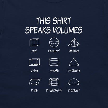 A navy blue t-shirt featuring a white graphic print that reads 'THIS SHIRT SPEAKS VOLUMES' above a grid of geometric shapes and their volume formulas.