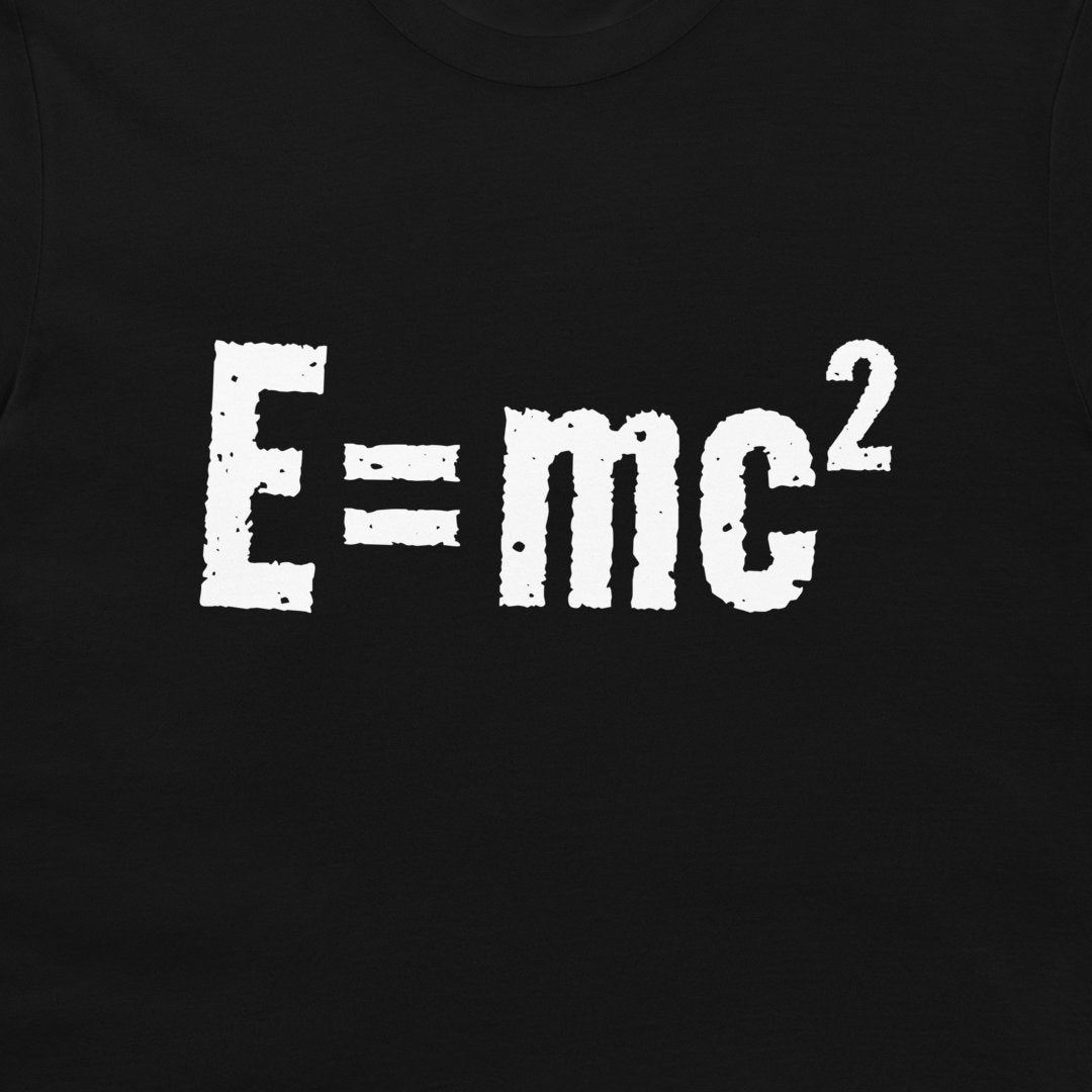 A close-up of a black garment, likely a t-shirt, featuring the white distressed text 'E=mc²' printed across the chest.