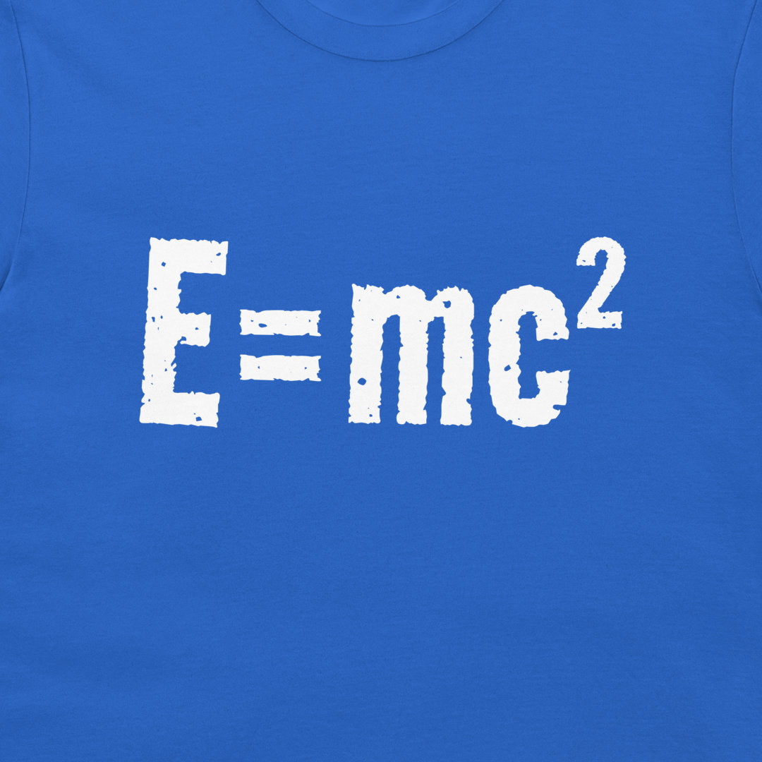 A close-up of a bright blue t-shirt featuring the white distressed text 'E=mc²' printed across the chest.